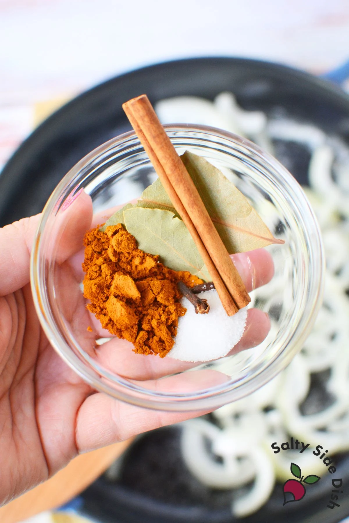 all of the seasonings and spices in a bowl.