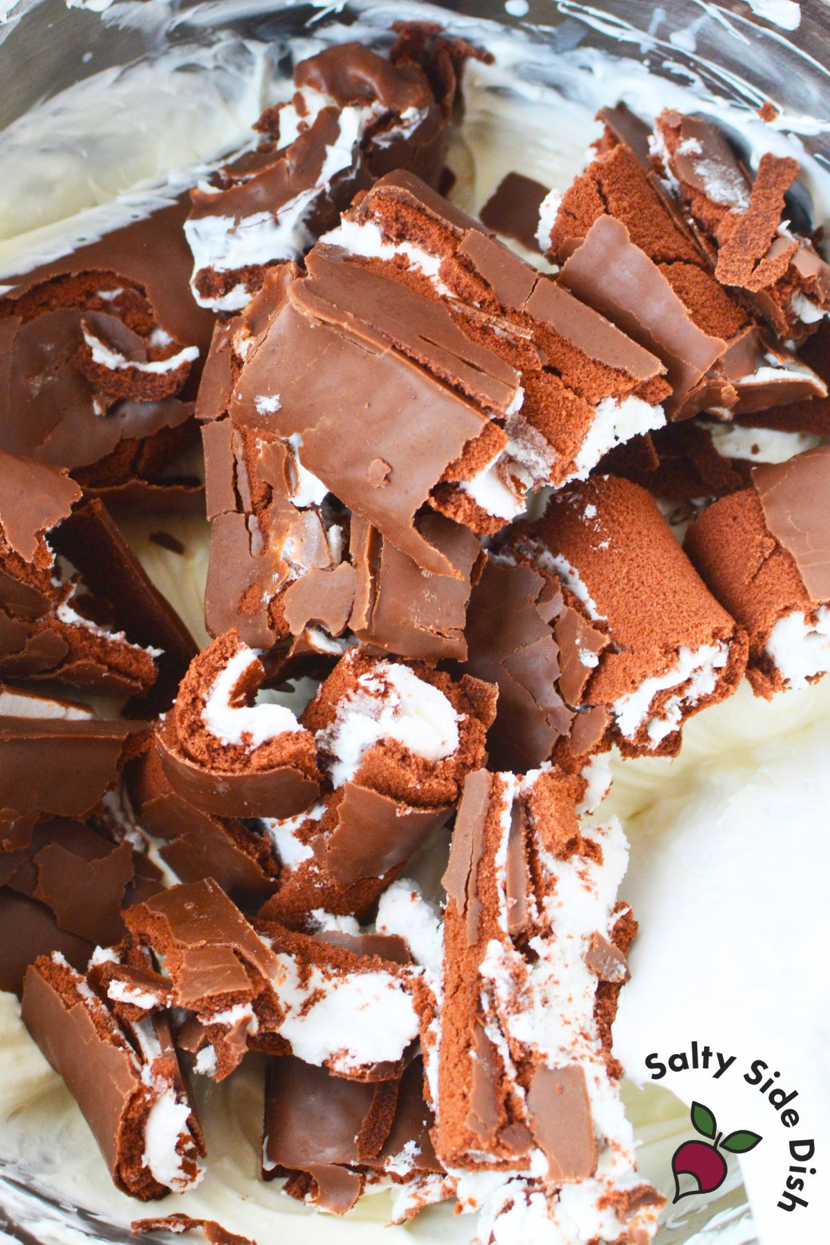 Crushed up swiss cake rolls.