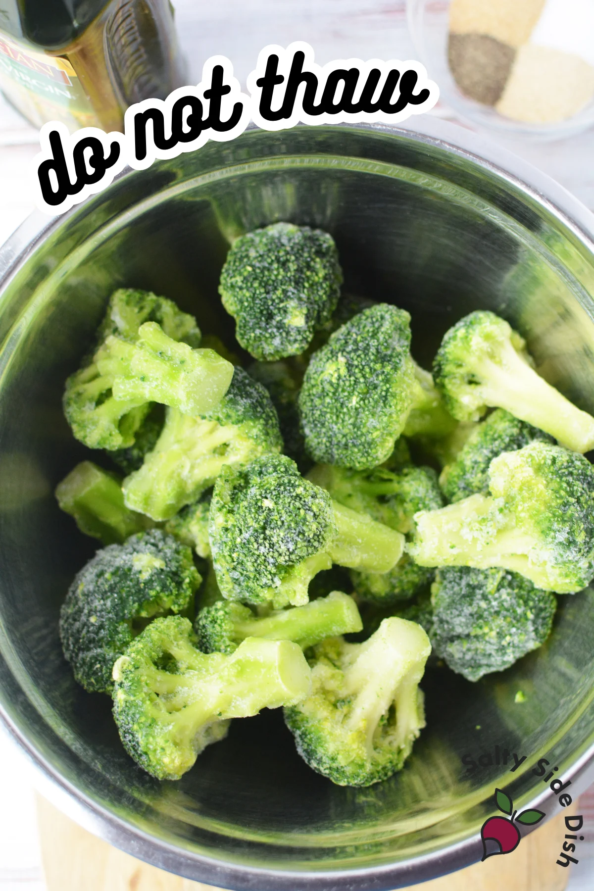 frozen broccoli in a metal bowl