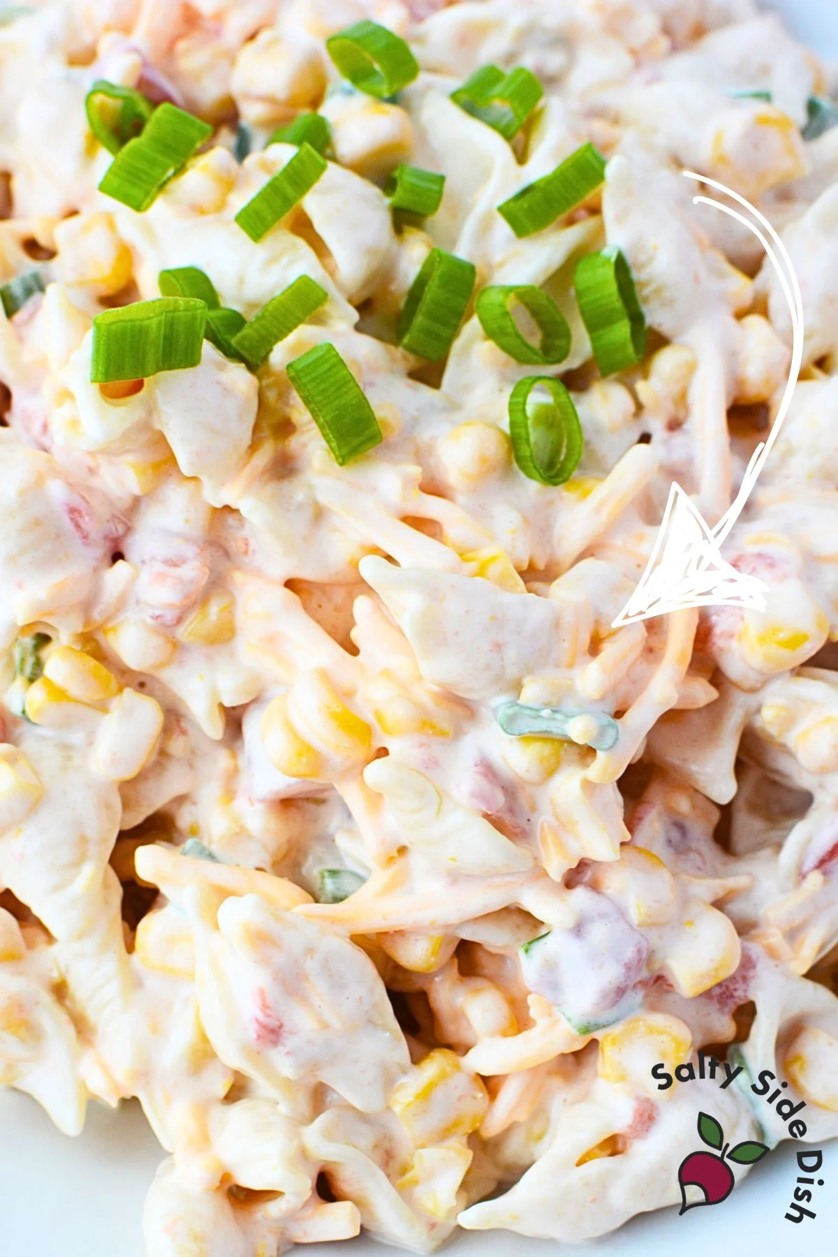 our best summer pasta salad recipe with shell pasta, cheese, corn, and rotel.