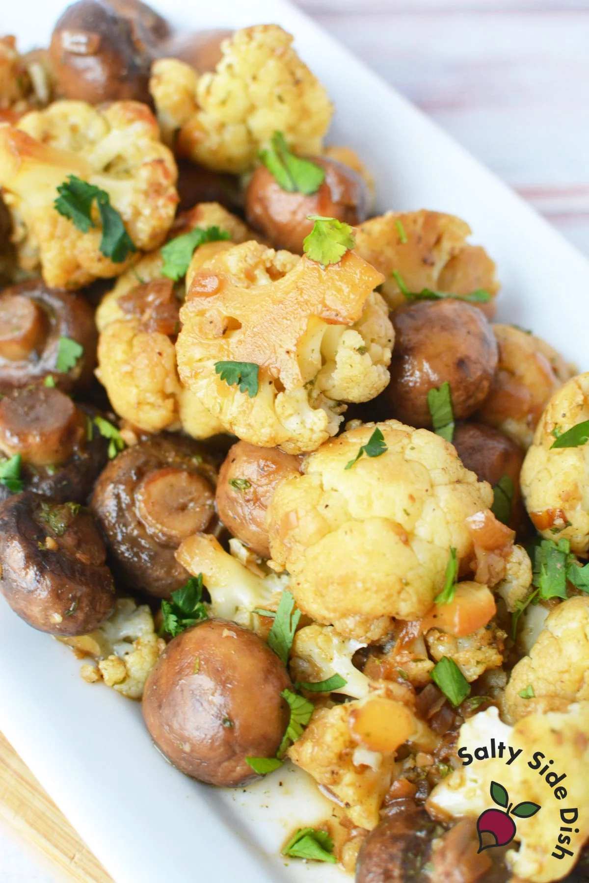 tender cauliflower and mushroom side dish recipe to be served.