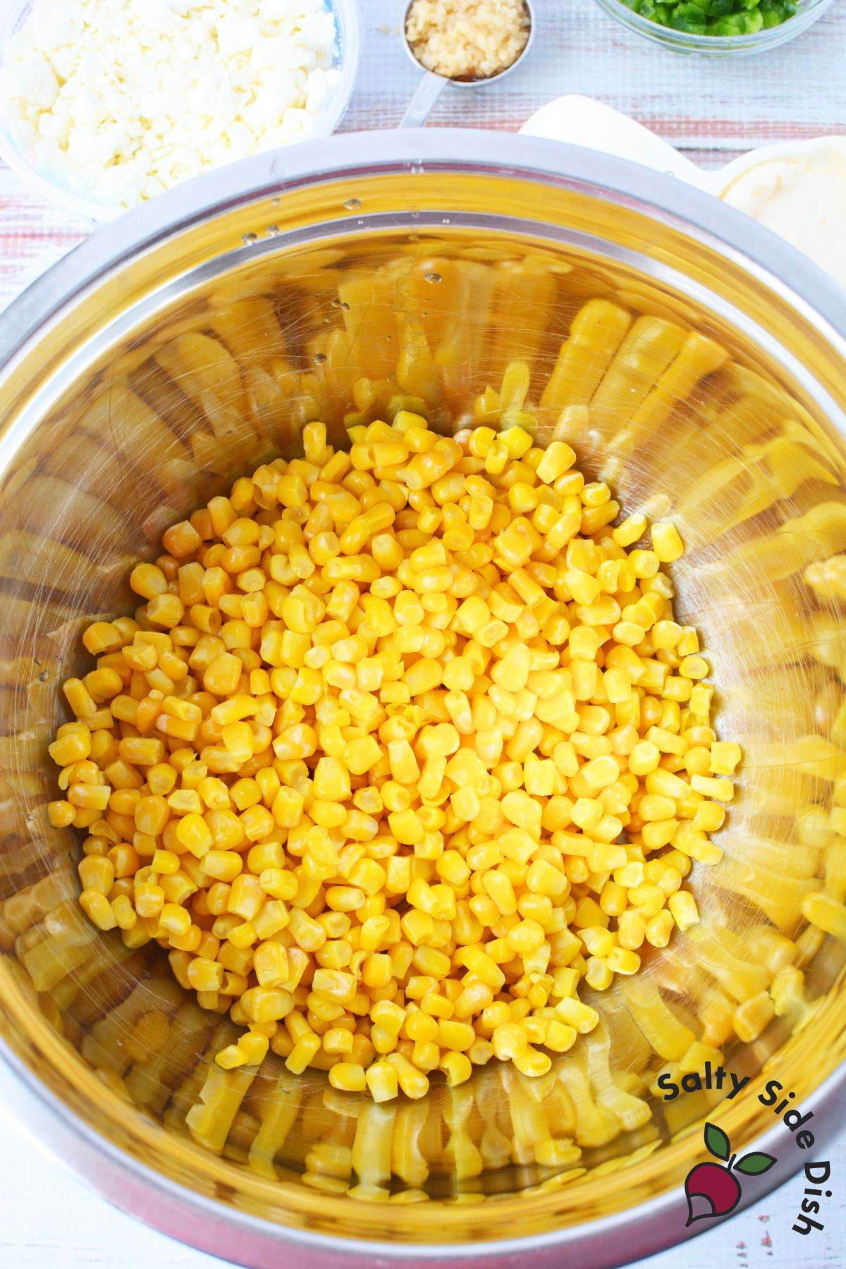 pasta salad ingredients in bowls.