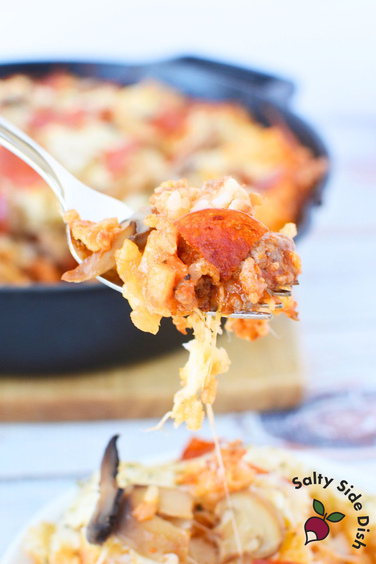 bite of this casserole dinner recipe on a fork.