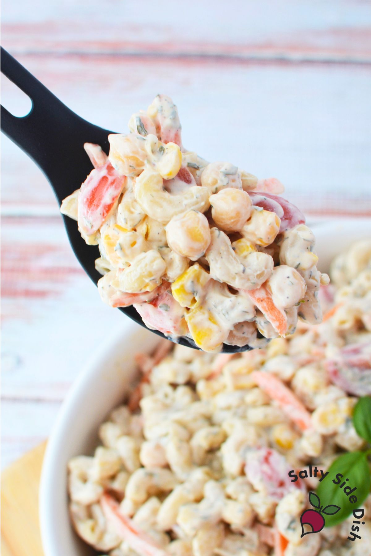 spoonful of chickpea pasta salad.