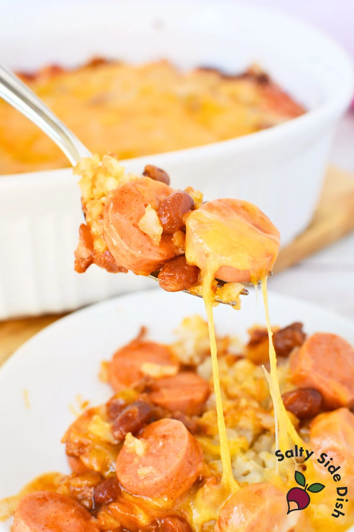 fork with finished chili cheese casserole.