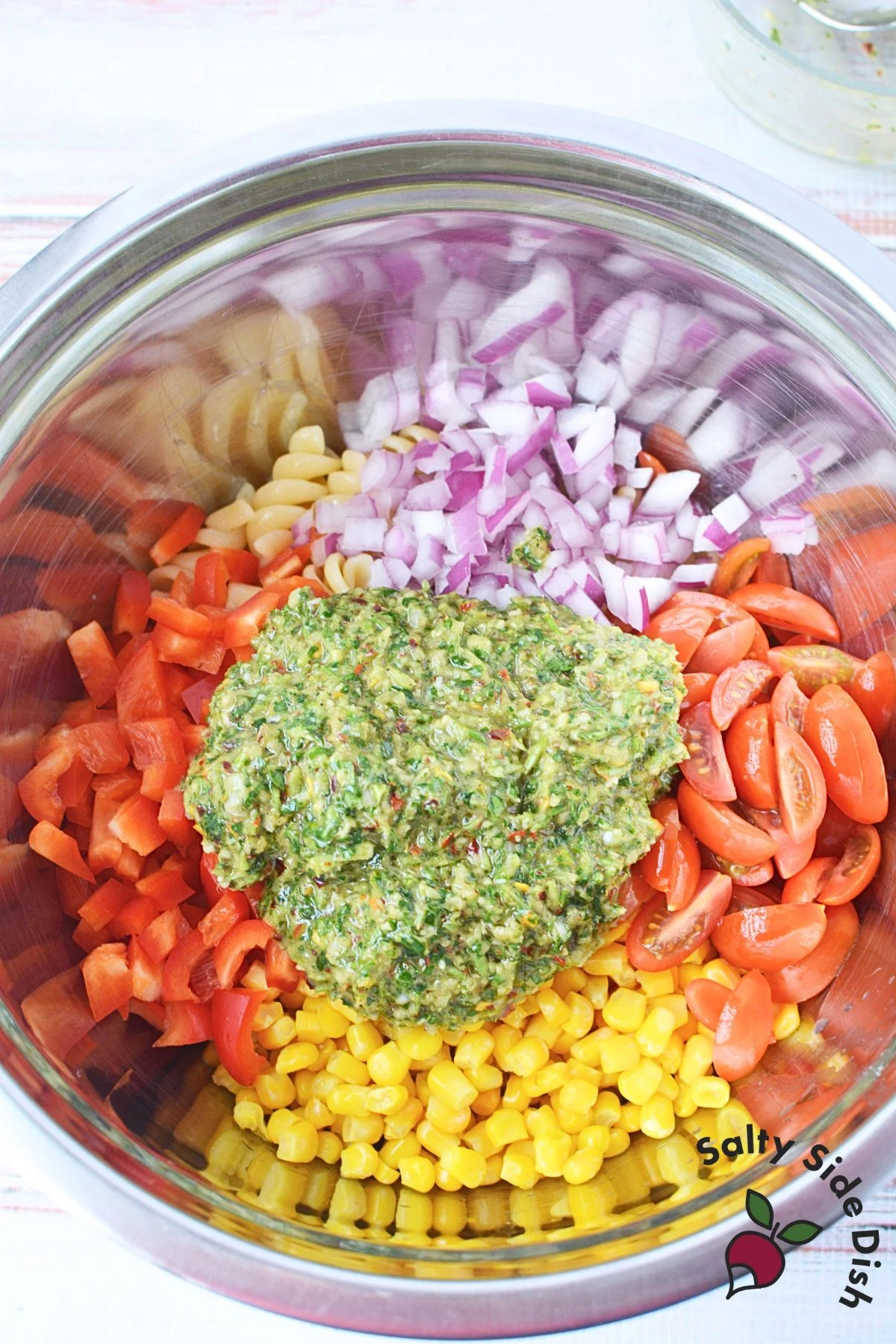 combined ingredients for pasta salad recipe.