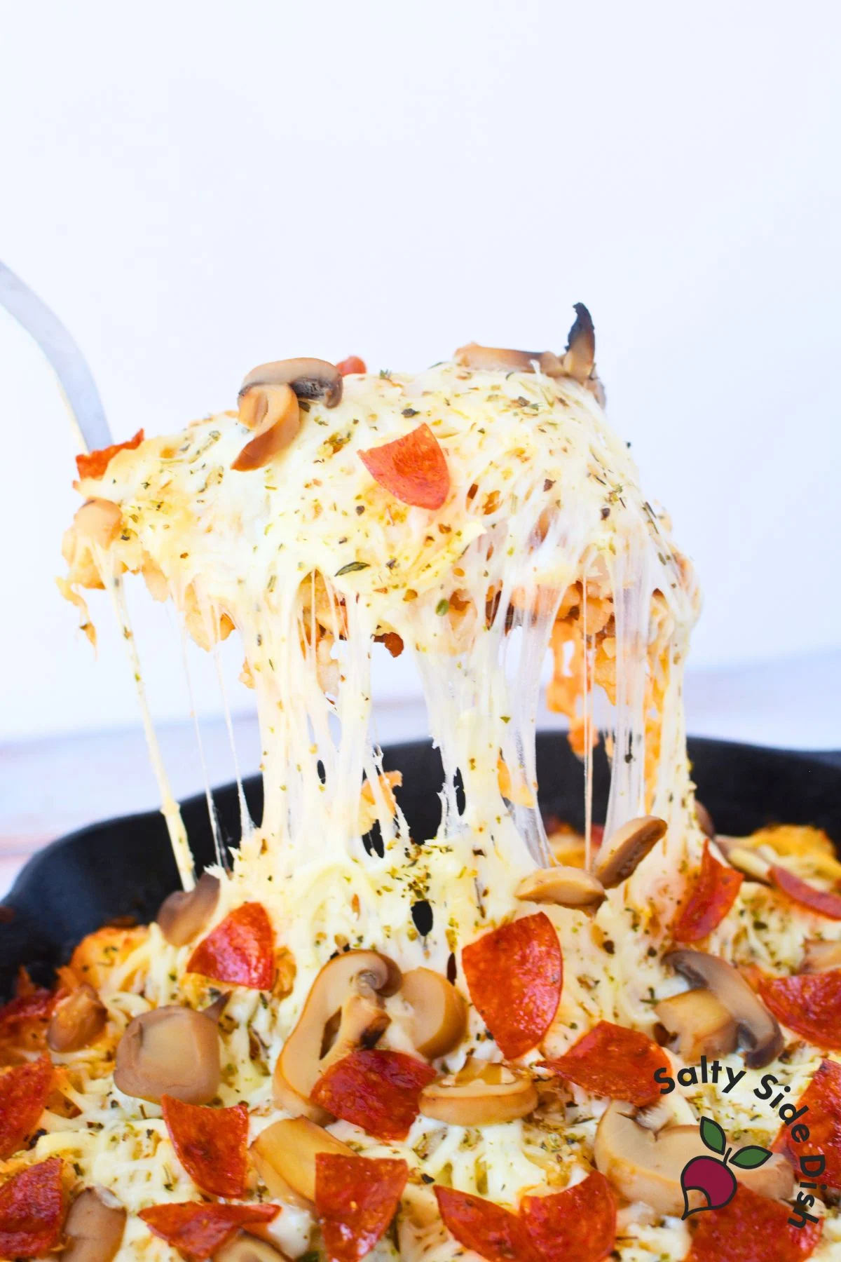 great and easy dinner perfect for families, this tater tot pizza casserole is done quickly.