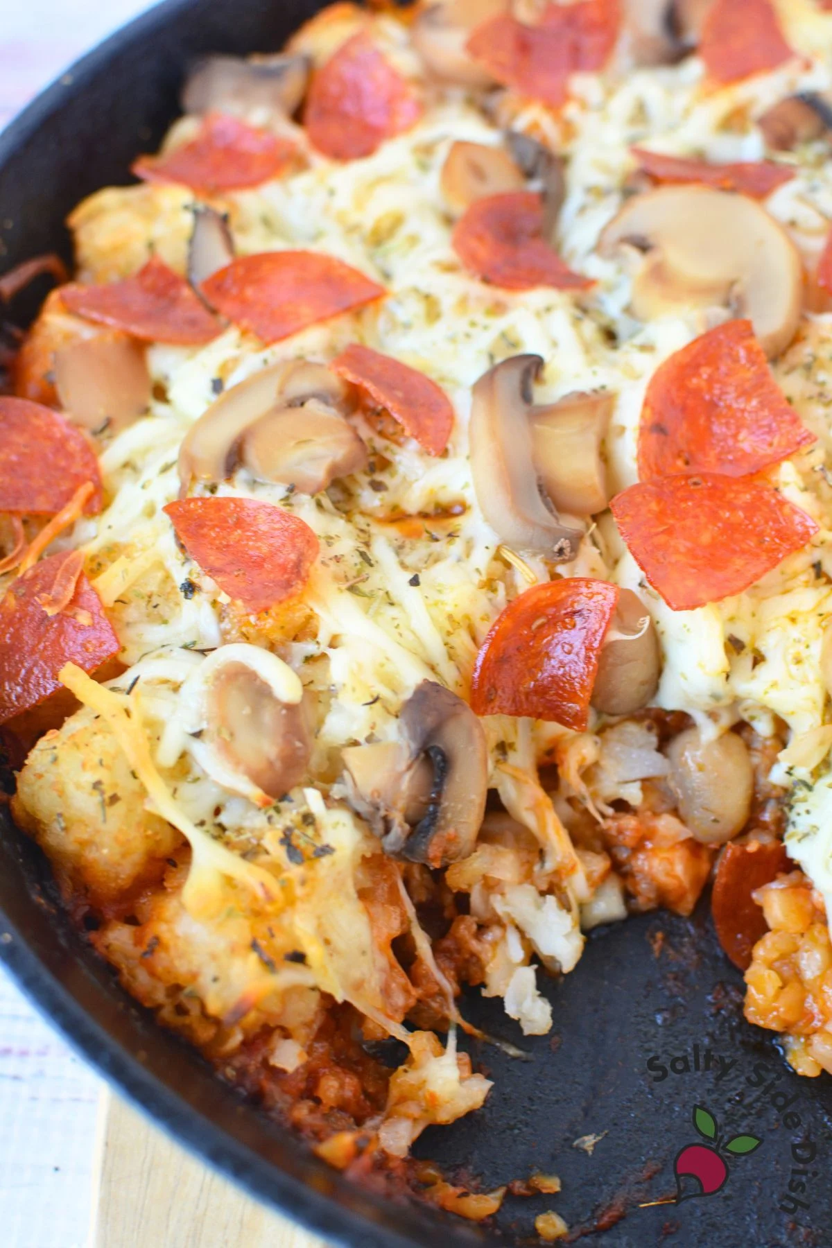 serving up pepperoni casserole.
