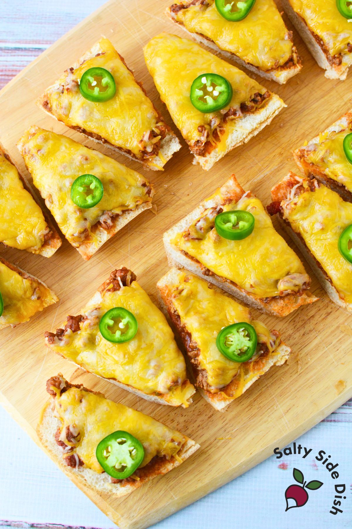 adding french bread with cheese and jalapeno.