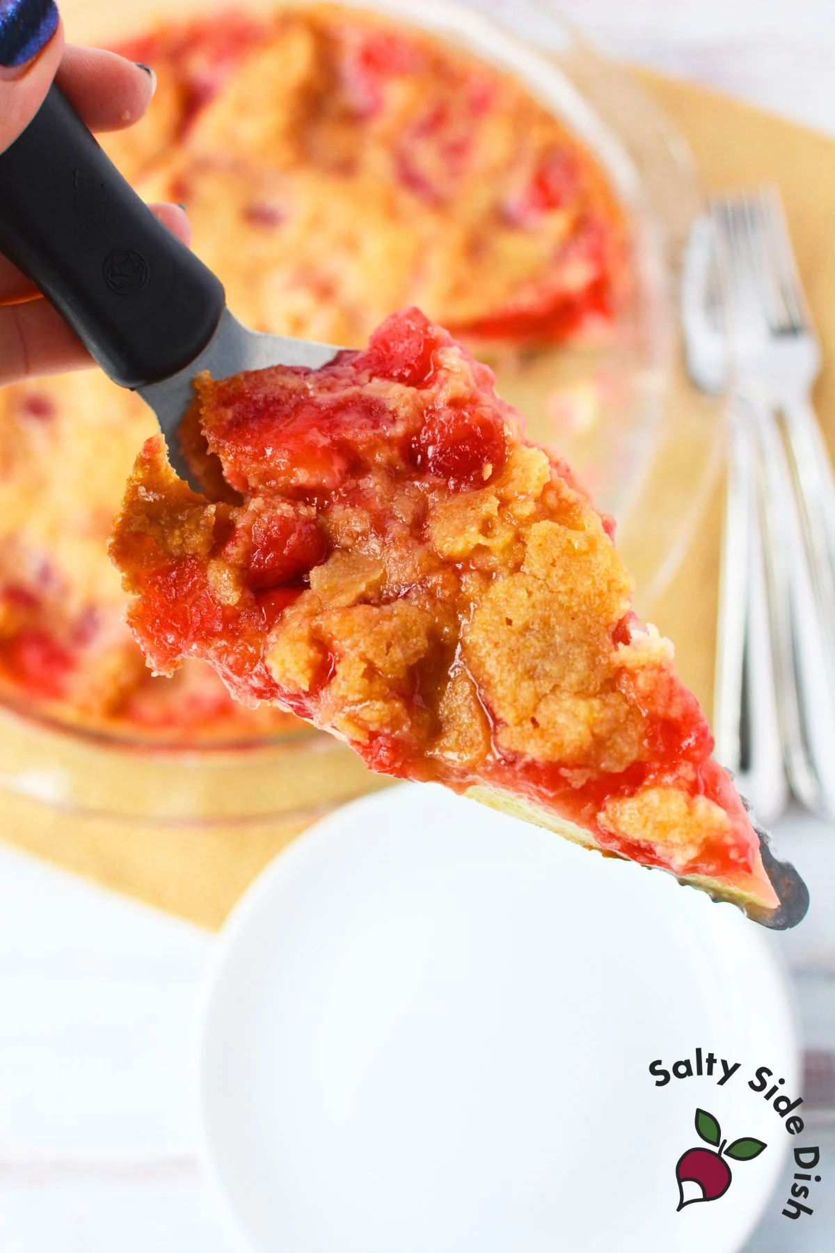 serving a slice of cherry pie.
