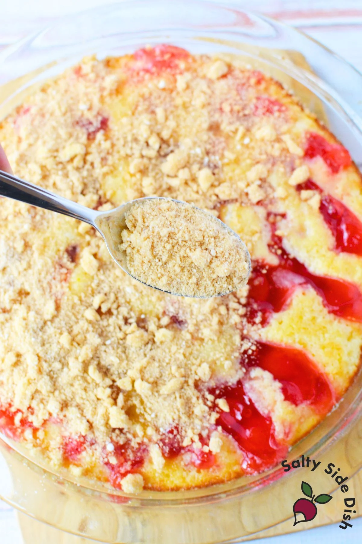 Collage showing step-by-step of combining Bisquick, sugar, eggs, and butter for cherry pie batter.