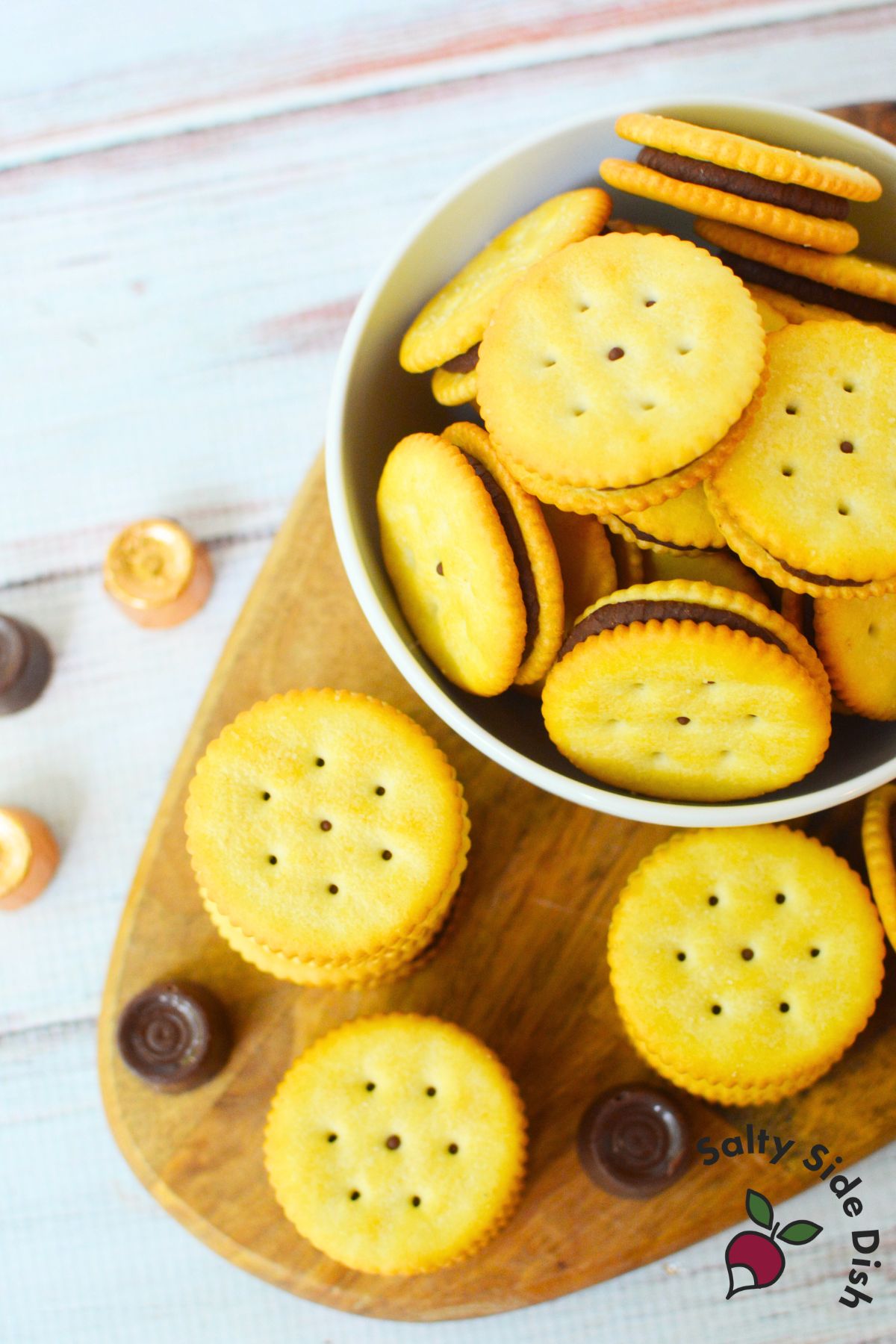Bowl filled with homemade Ritz cracker and Rolo chocolate caramel cookies