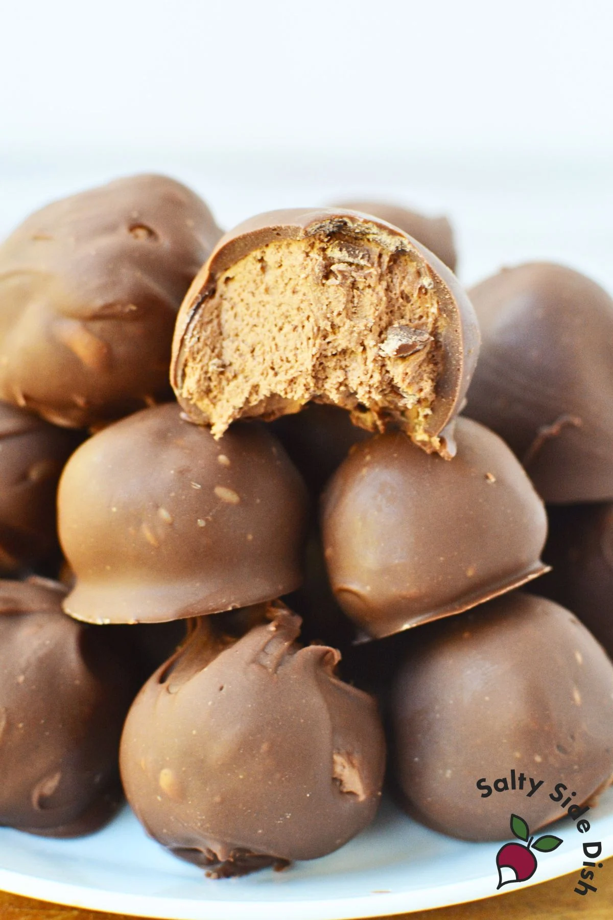 copycat 3 Musketeers candy made with cool whip showing whipped chocolate center inside holiday truffle style candy