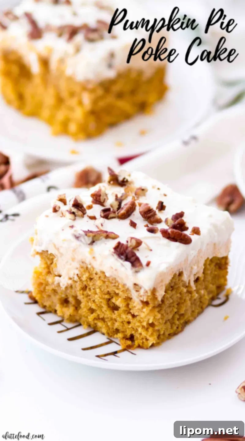 the best pumpkin poke cake slice with pumpkin cream filling