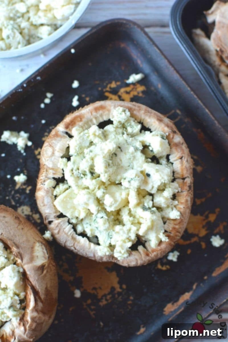 Baked Stuffed Portobello Mushrooms recipe Freshly baked Stuffed Portobello Mushrooms with crumbled blue cheese and golden bread crumbs