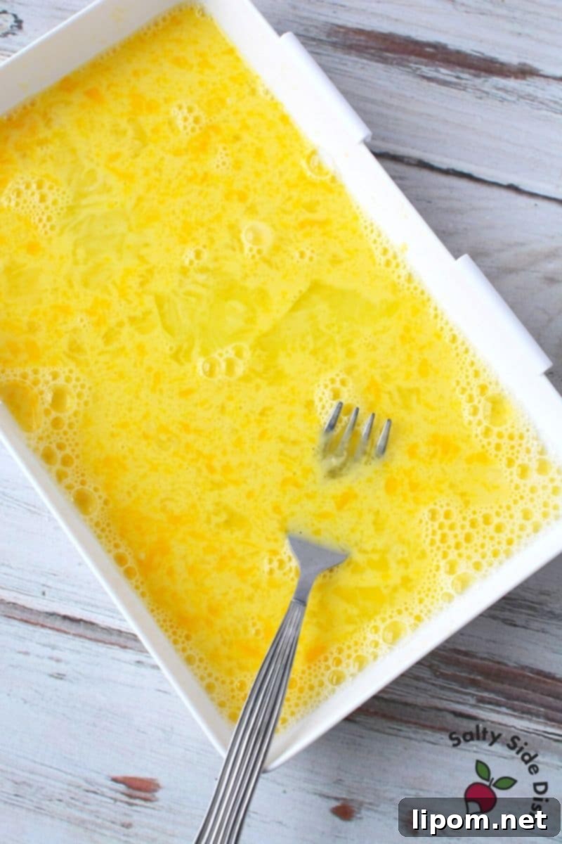 Perfect Egg Wash for Crispy Homemade Chicken Nuggets Simple and effective egg wash mixture in a bowl, ready for chicken nugget coating