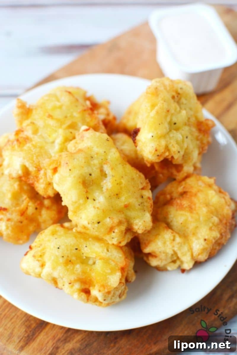Your Homemade McDonald's Chicken McNuggets Await! A delicious platter of golden-brown, crispy Copycat McDonald's Chicken Nuggets