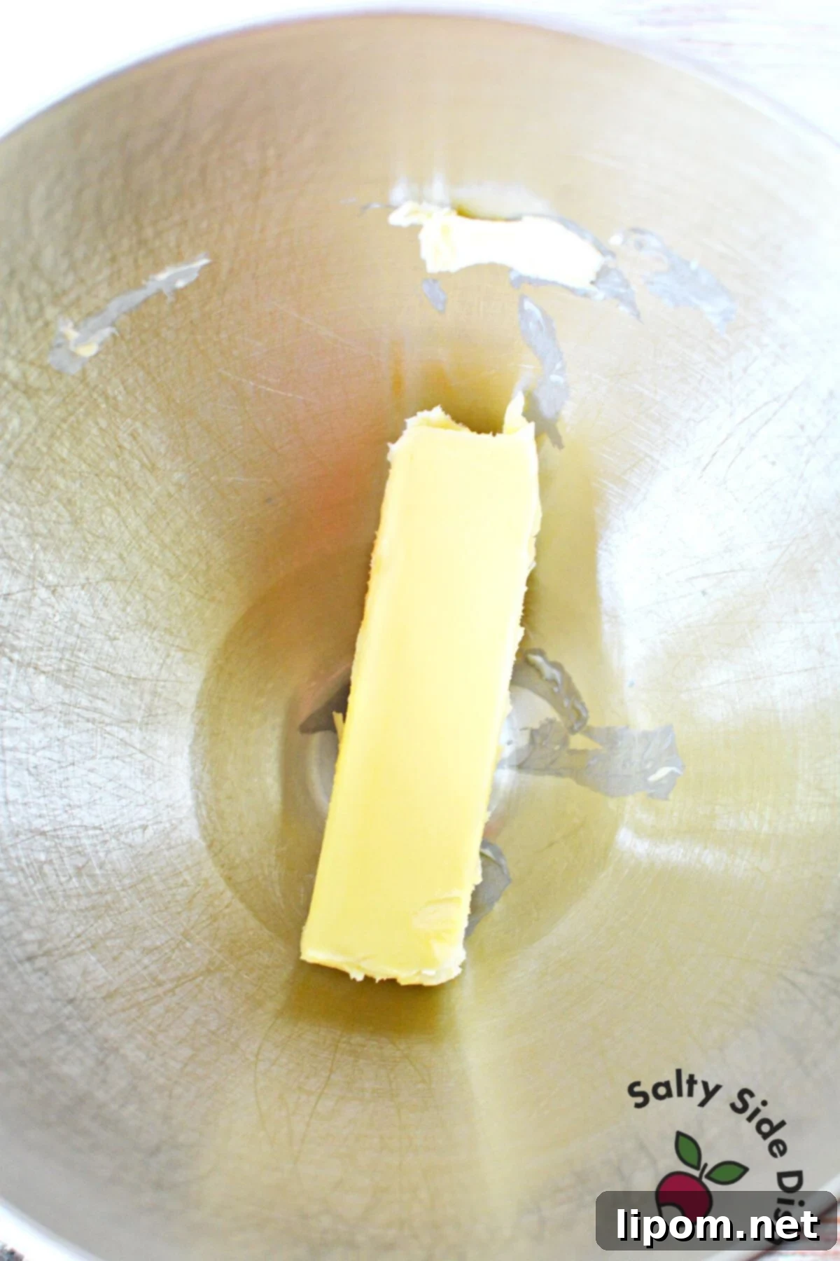 Silken Buttercream 4 softening butter in a bowl.