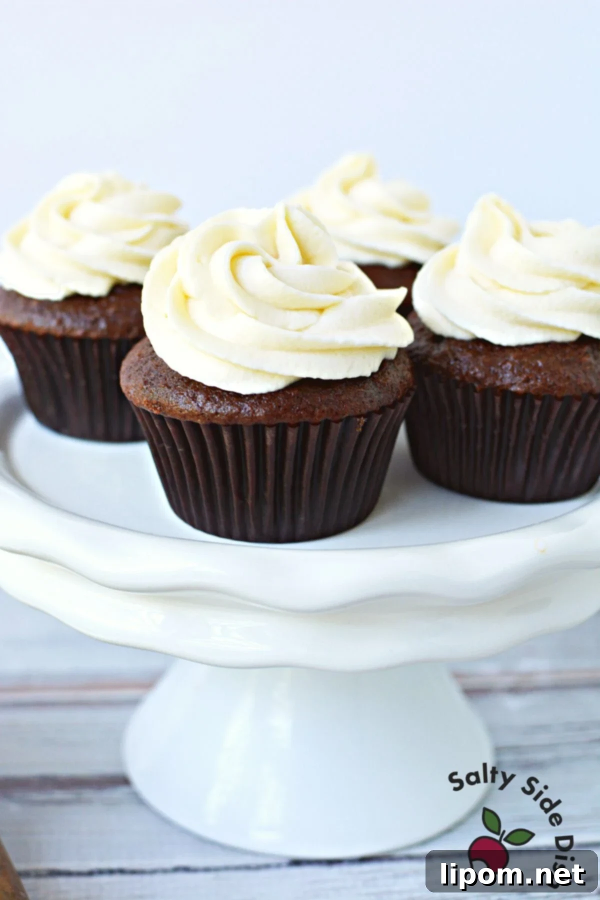 Silken Buttercream 6 2 ingredient buttercream recipe on a chocolate cupcake.