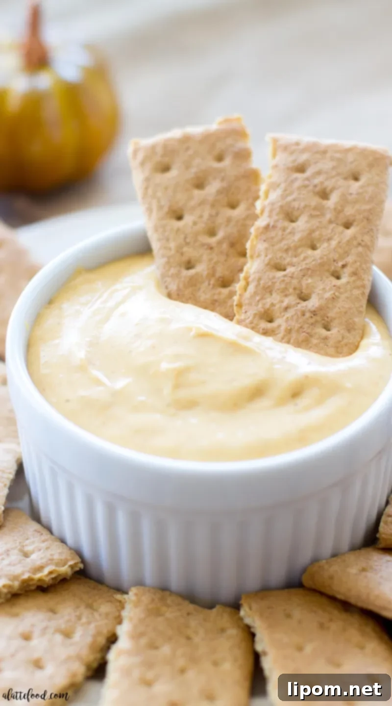 easy pumpkin pie fluff dip in white bowl