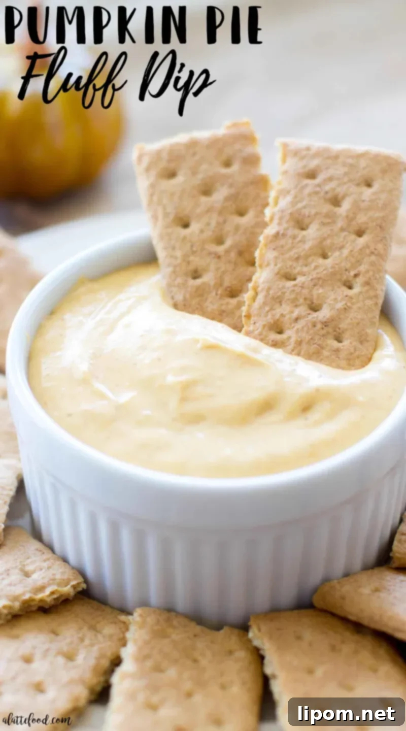 Pumpkin Pie Fluff Dip -- pumpkin marshmallow dip in bowl