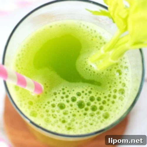 Celery Juice 10 close up of celery juice in a tall glass.