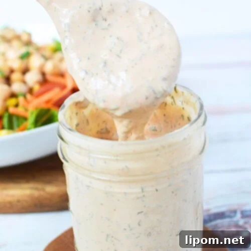A high-quality image of BBQ Ranch dressing in a mason jar, perfectly garnished and ready for use.