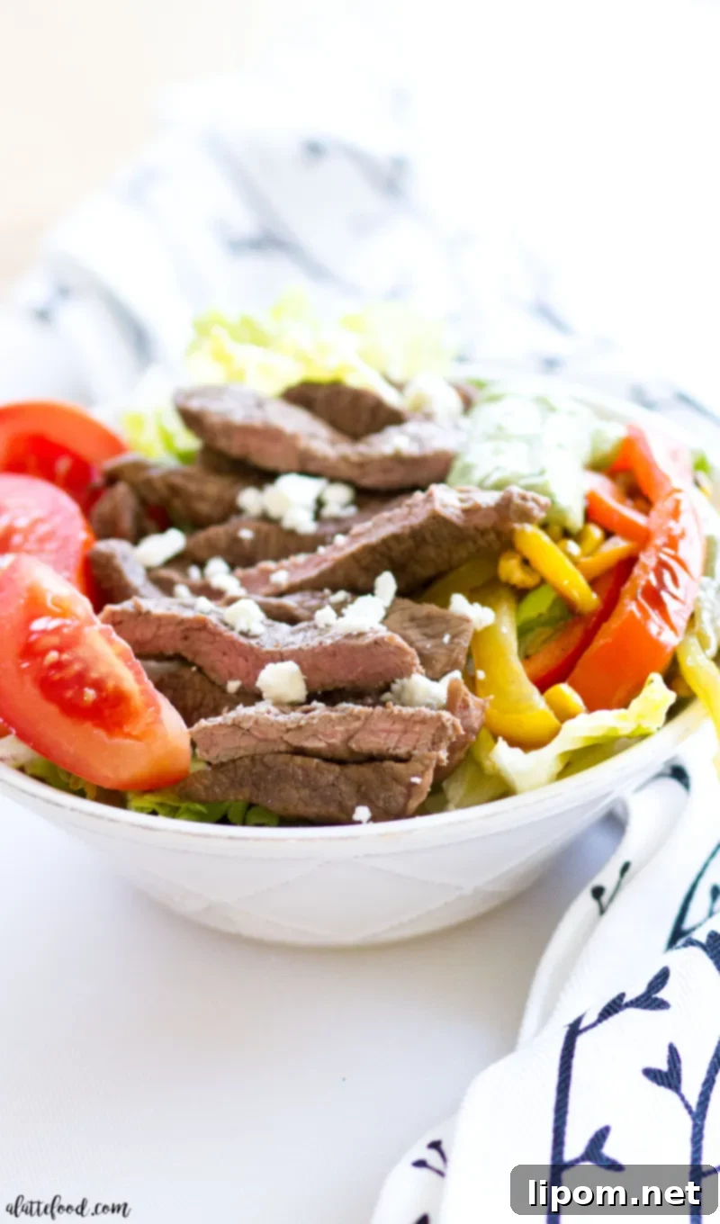 Plated Fajita Steak Salad with Cilantro Avocado Dressing