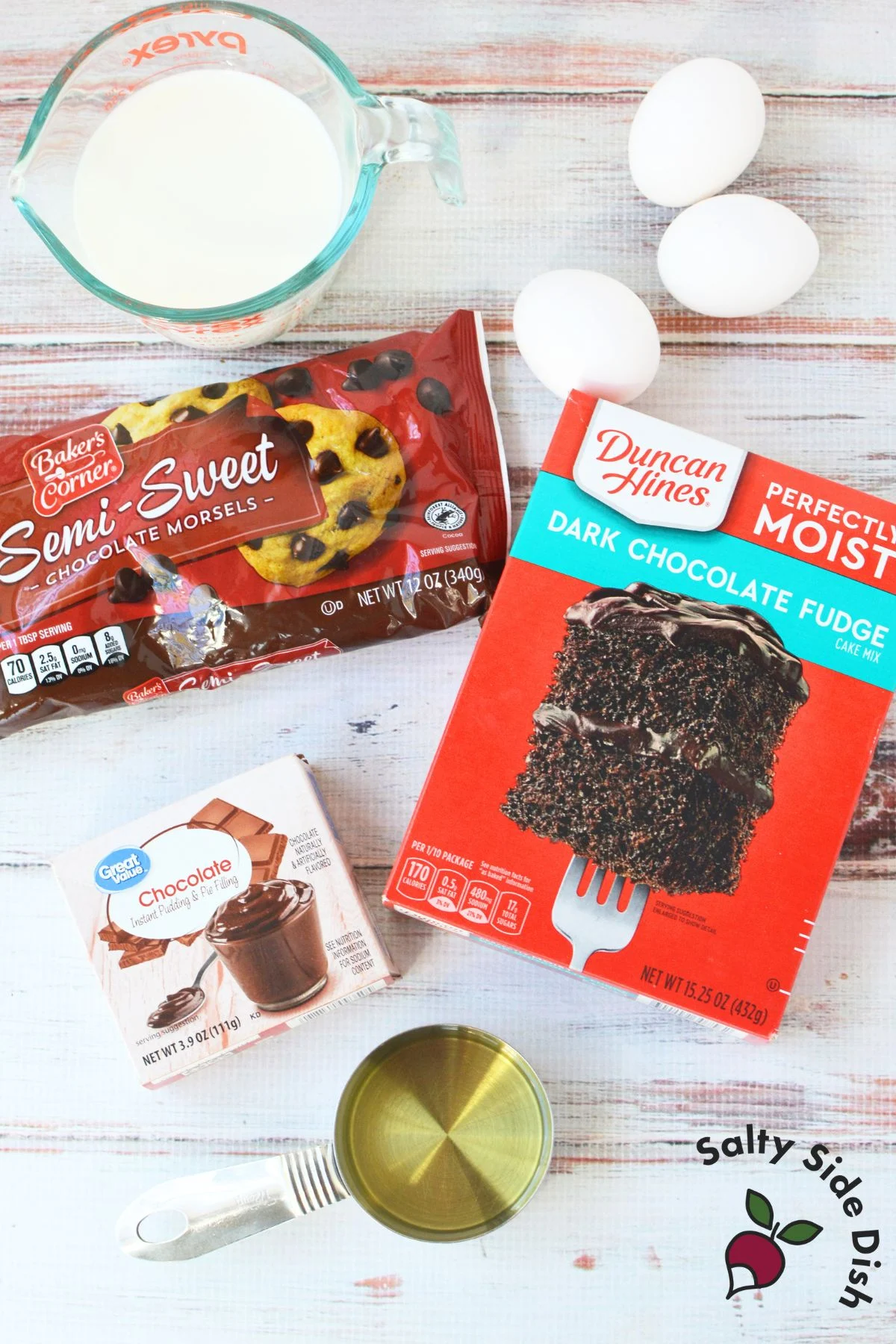 Ingredients for crockpot chocolate lava cake including cake mix, pudding, and chocolate chips