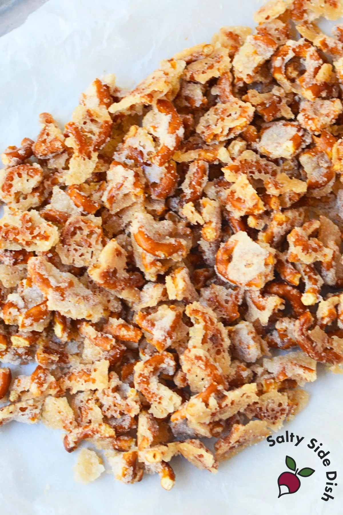 Sugared pretzel clusters baked until crunchy for pineapple fluff dessert with pretzels