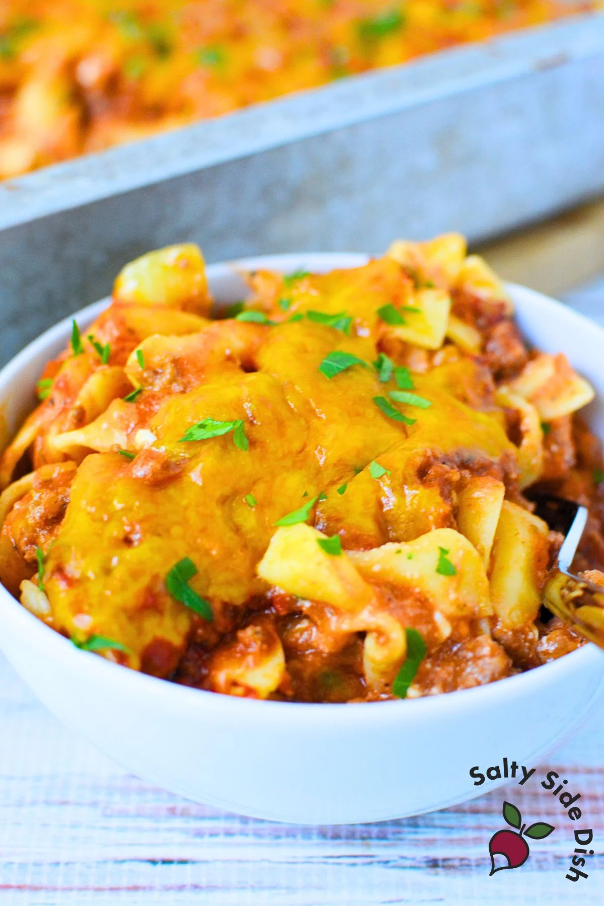 cheesy tomato beef noodle casserole fresh out of the oven