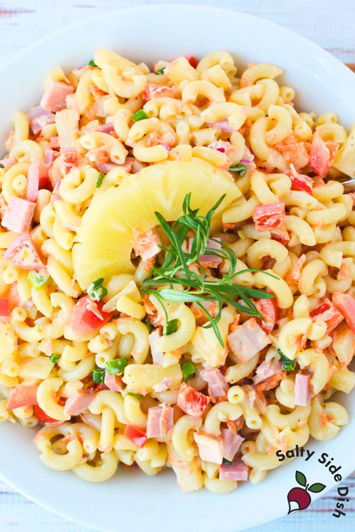 Overhead view of Hawaiian pasta salad with pineapple ham elbow pasta and creamy dressing