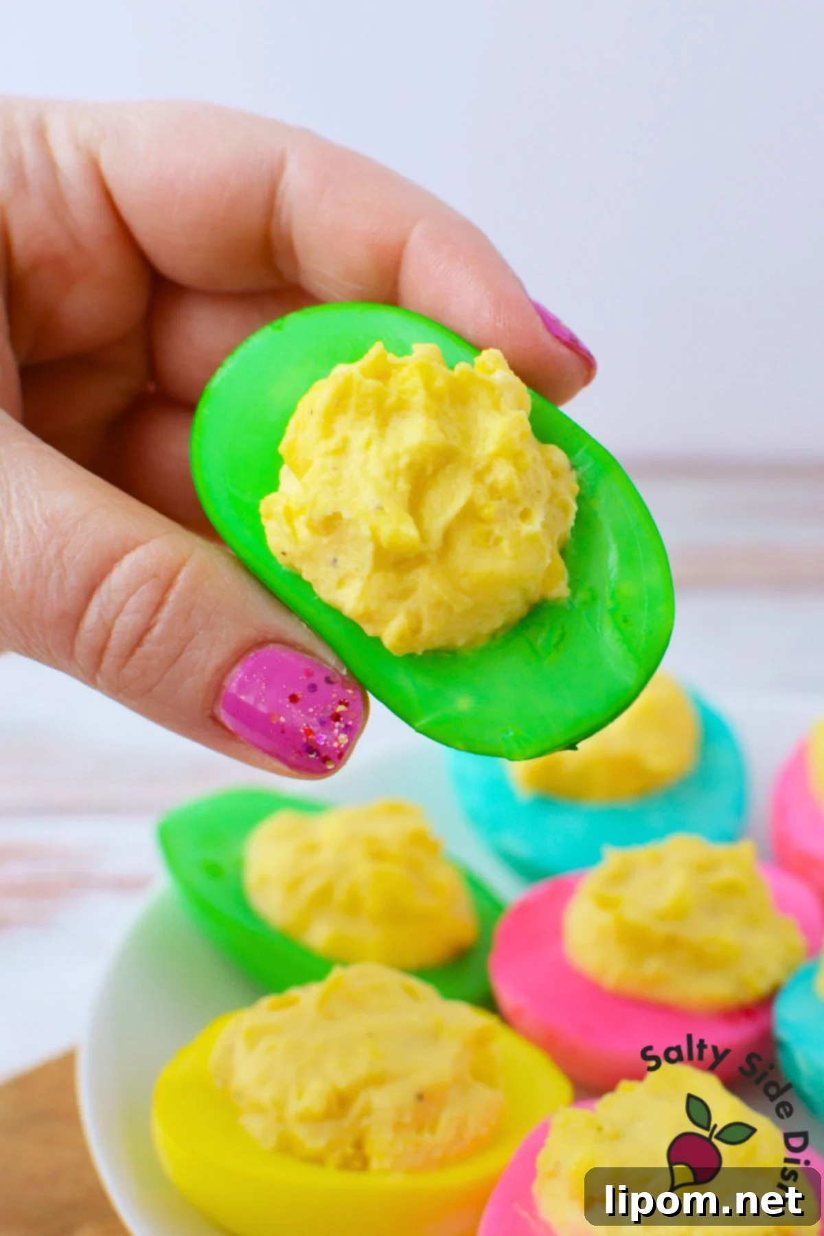 Dyed easter eggs with deviled egg filling