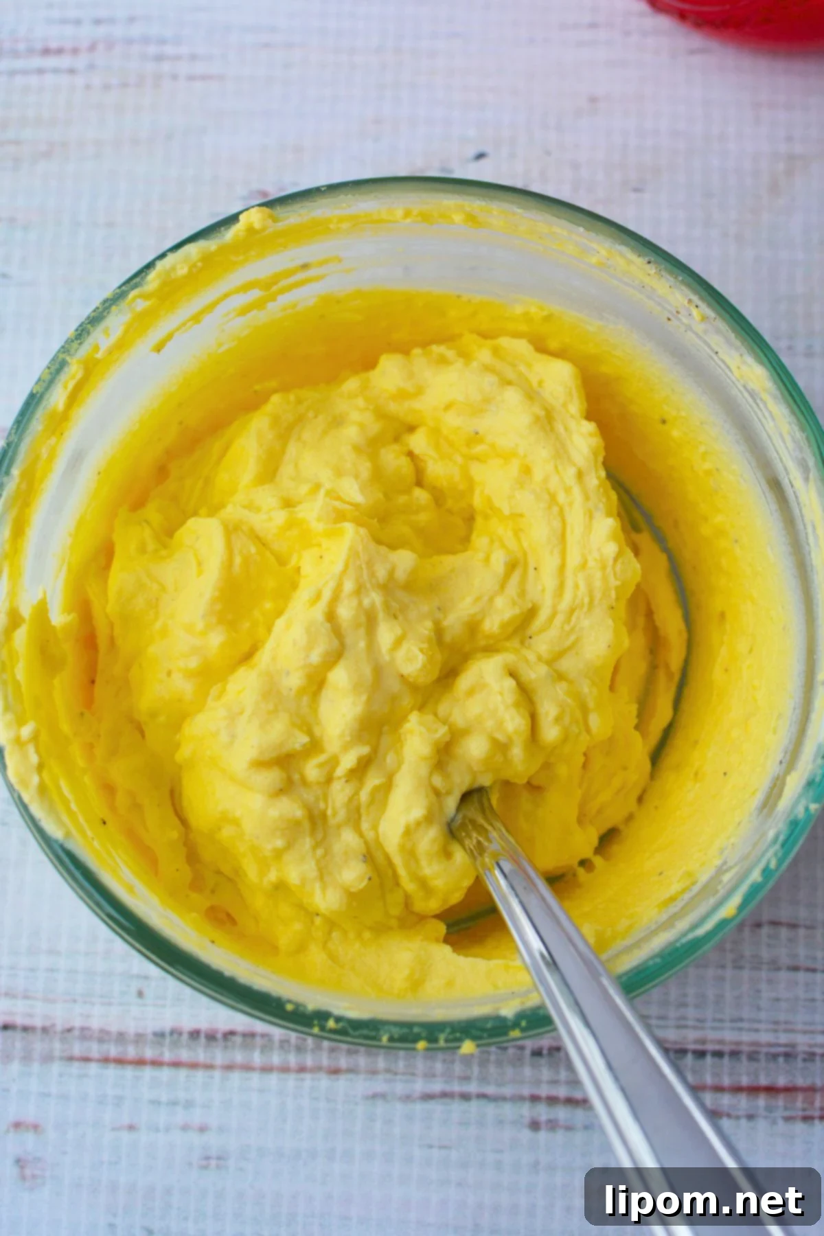 Classic deviled egg filling made with egg yolks, mayonnaise, and mustard mixed until smooth