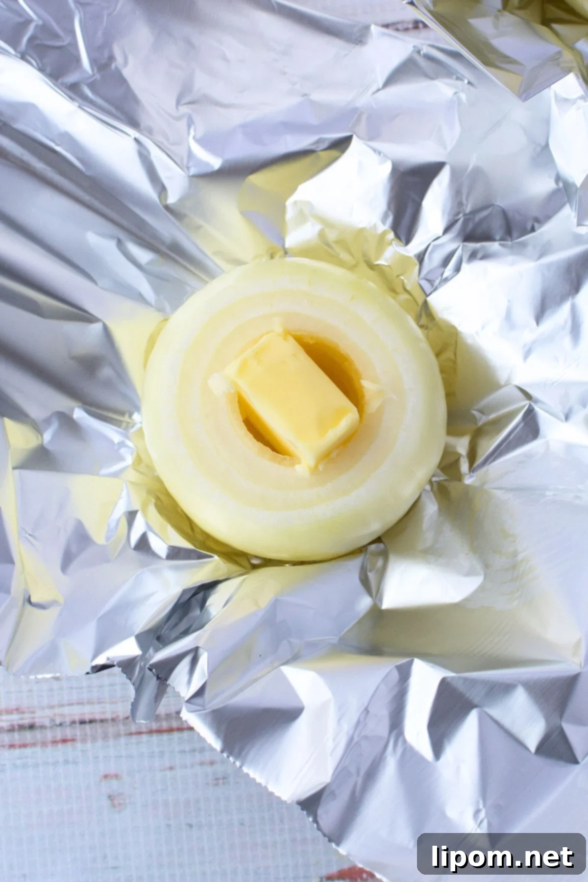Viral TikTok Onion Simmer Sensation 5 Adding butter to the onions