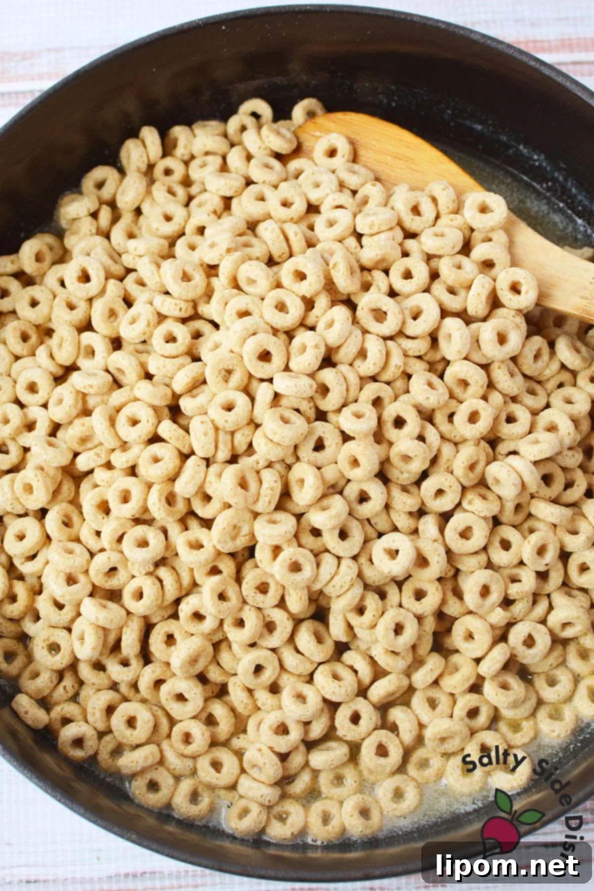 Pan-Fried Cinnamon Toast Cereal Bites 5 Skillet full of pan fried cinnamon sugar Cheerios toasted golden brown