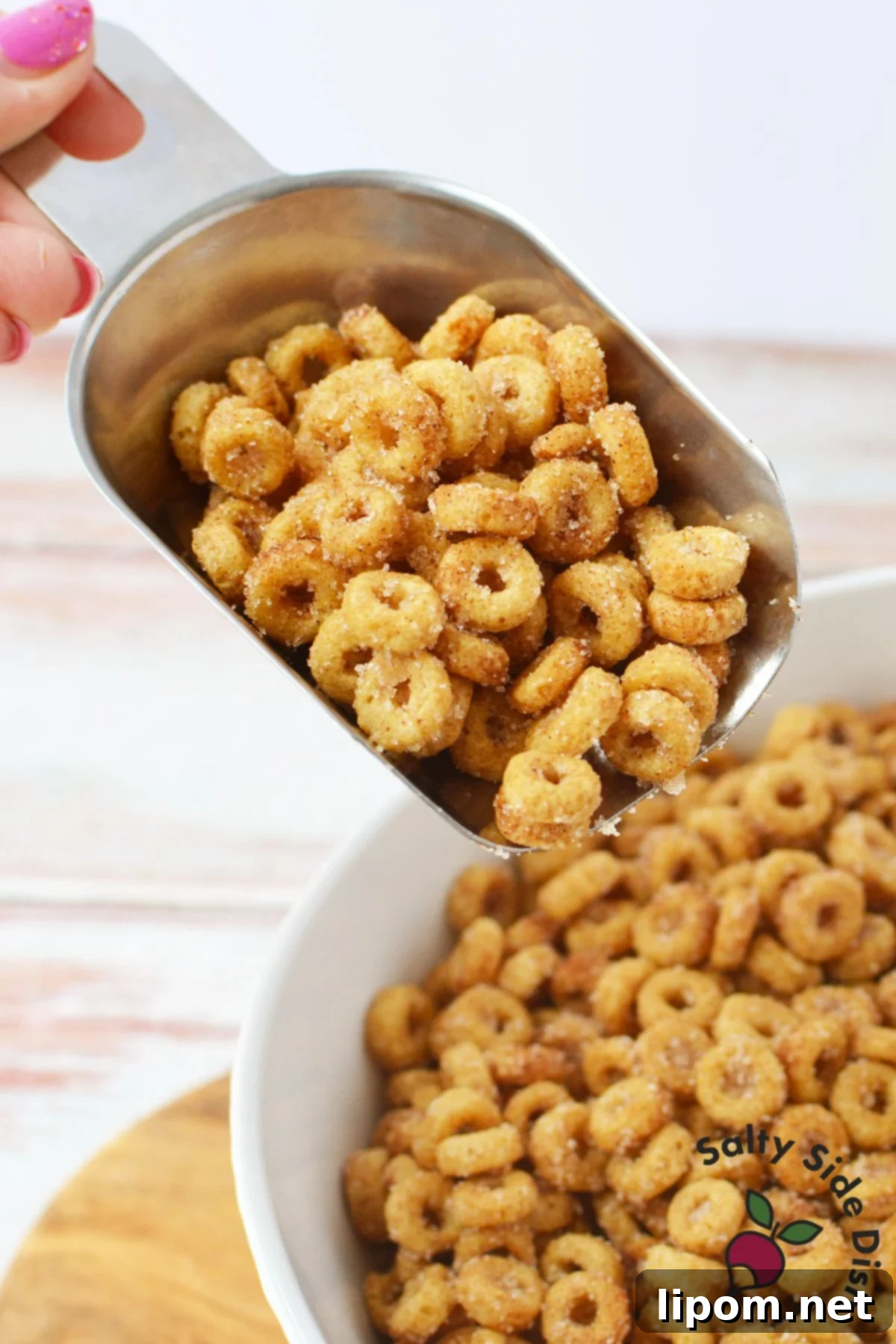 Pan-Fried Cinnamon Toast Cereal Bites 7 Close up of buttery cinnamon sugar Cheerios coated evenly after stovetop cooking