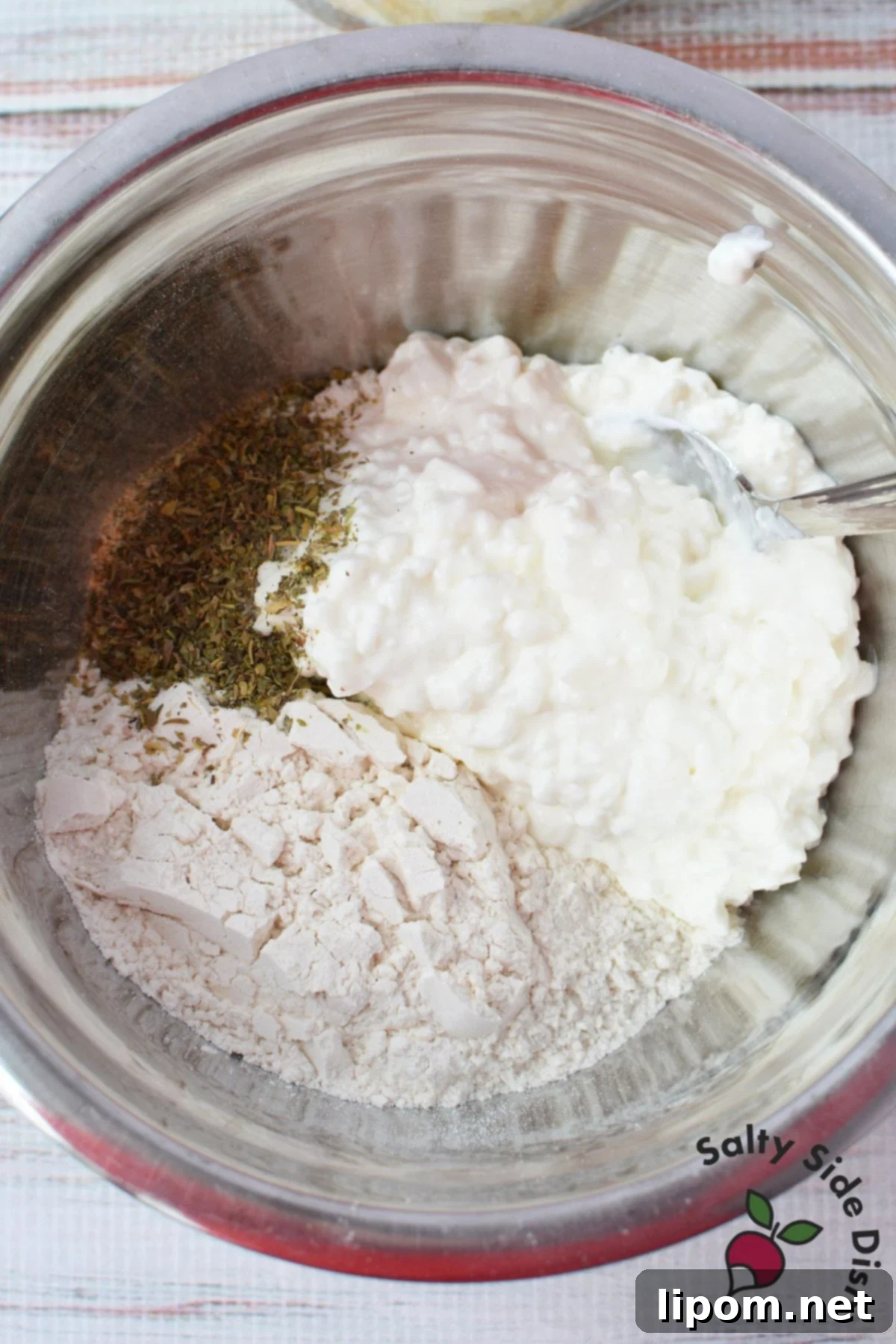 Cottage Cheese Pizza Bites 3 Flour, cottage cheese, and Italian seasoning in a mixing bowl