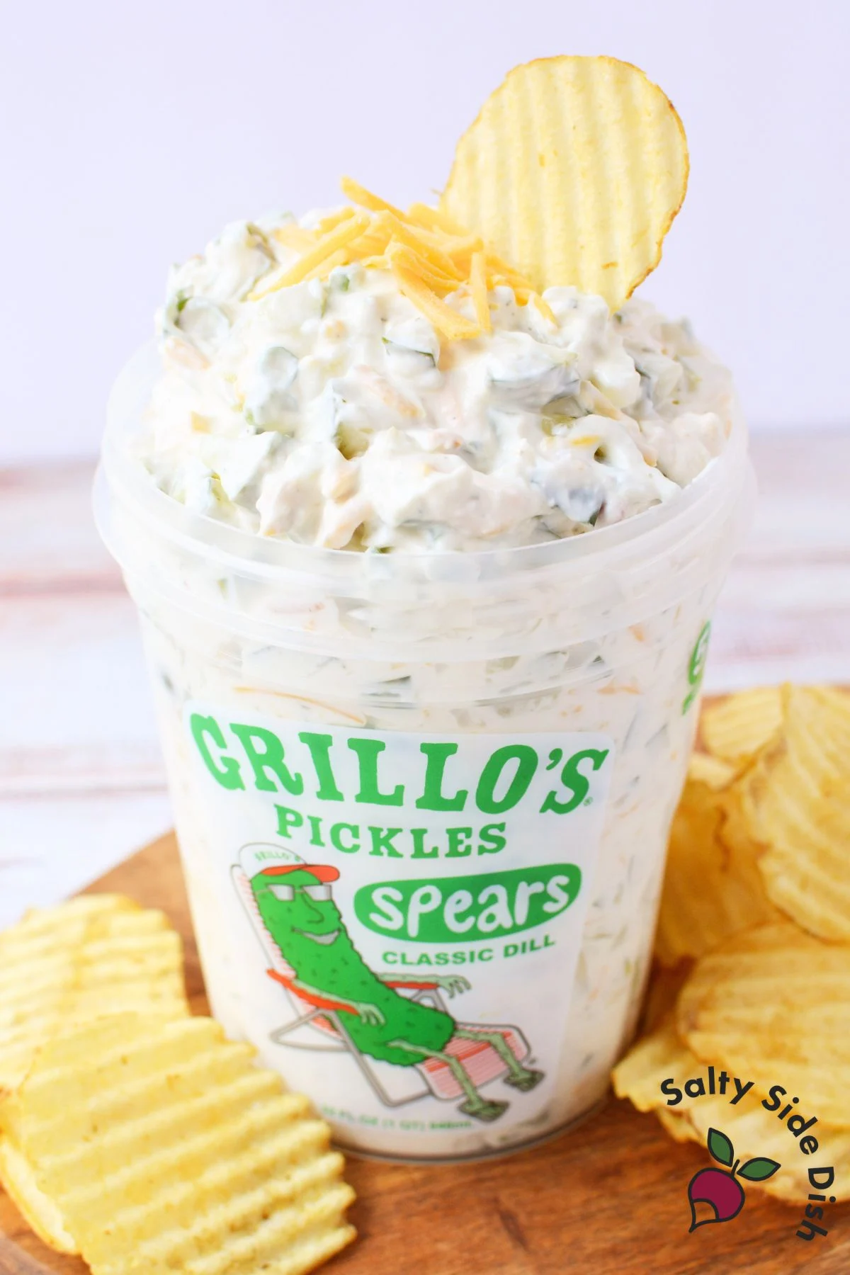 Finished Grillo’s pickle dip served in a Grillo’s pickle container with chips