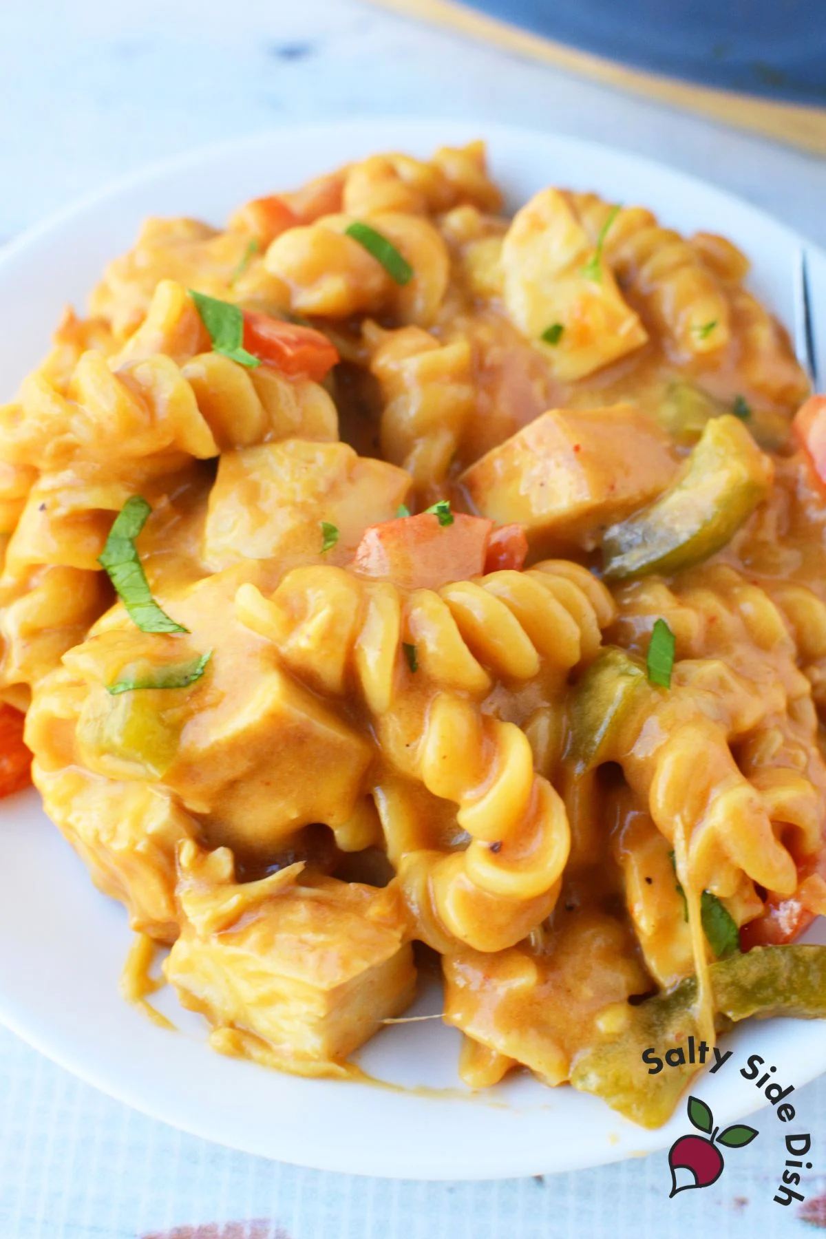 Close up of fajita chicken macaroni and cheese with tender pasta and a creamy sauce