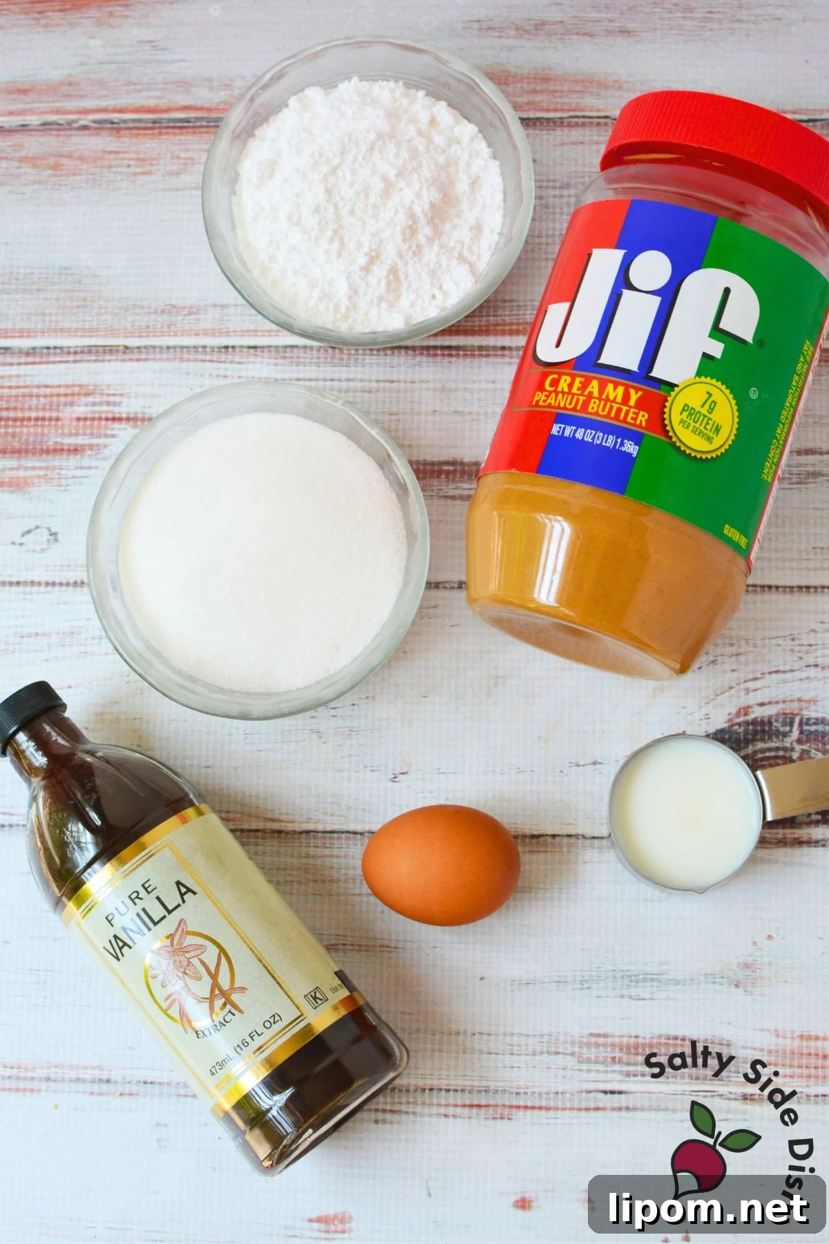 Copycat Nutter Butter Peanut Butter Cookies 3 Ingredients for homemade Nutter Butter cookies including powdered sugar, granulated sugar, peanut butter, vanilla, egg and milk