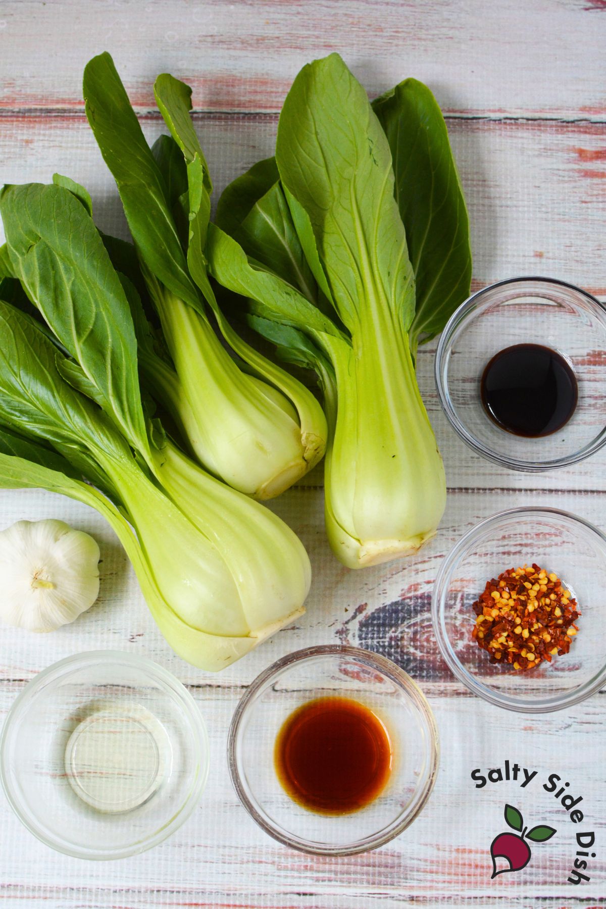Fresh baby bok choy with garlic, soy sauce, oyster sauce, oil, and crushed red pepper