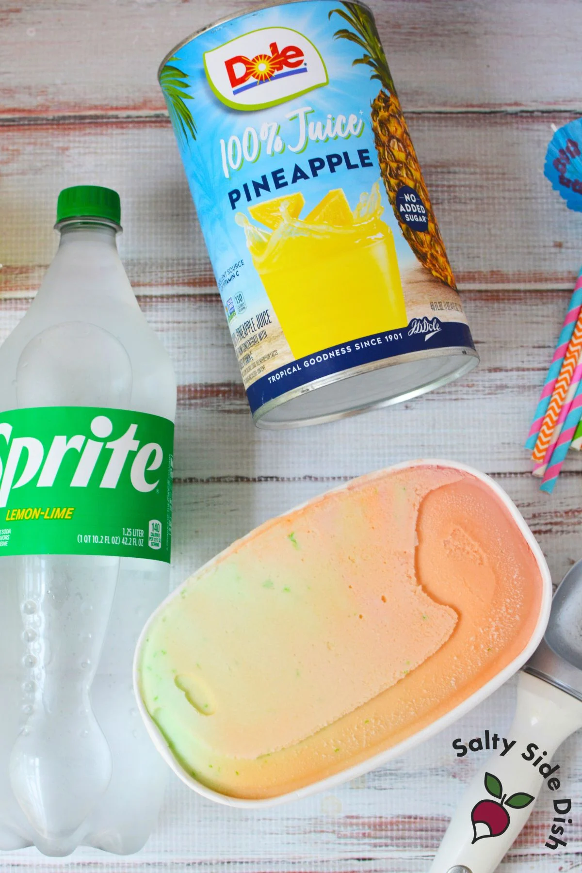 Ingredients for rainbow sherbet punch with Sprite, pineapple juice, and rainbow sherbet